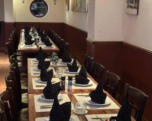 Lebanese Village restaurant private event setup with long table dining arrangements