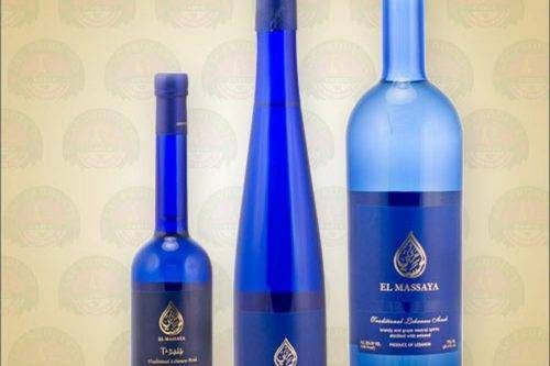 Premium El Massaya Arak blue bottles for Lebanese Village authentic drinks and spirits menu.